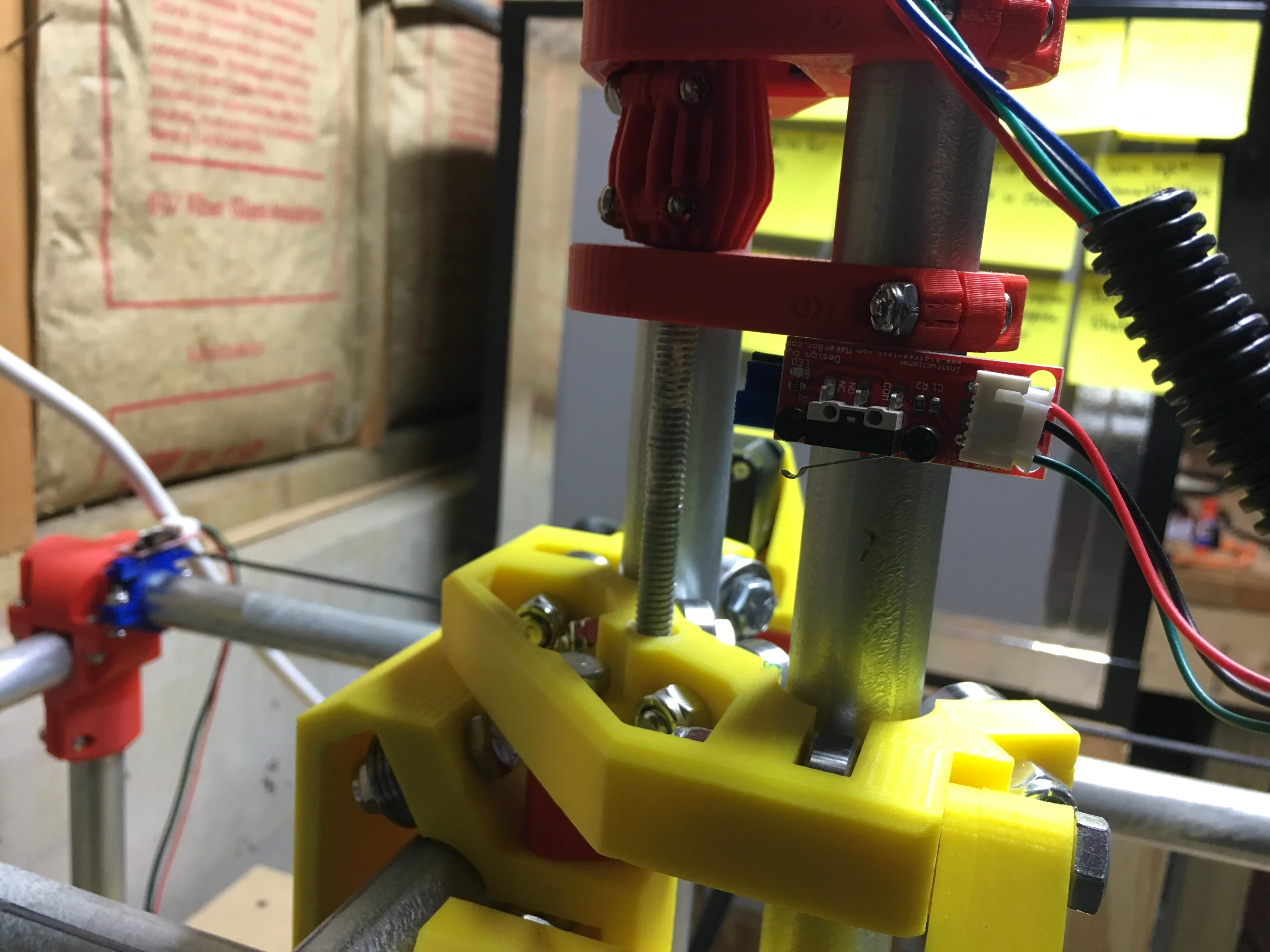 Custom electronics controller mounted to a metal machine frame
