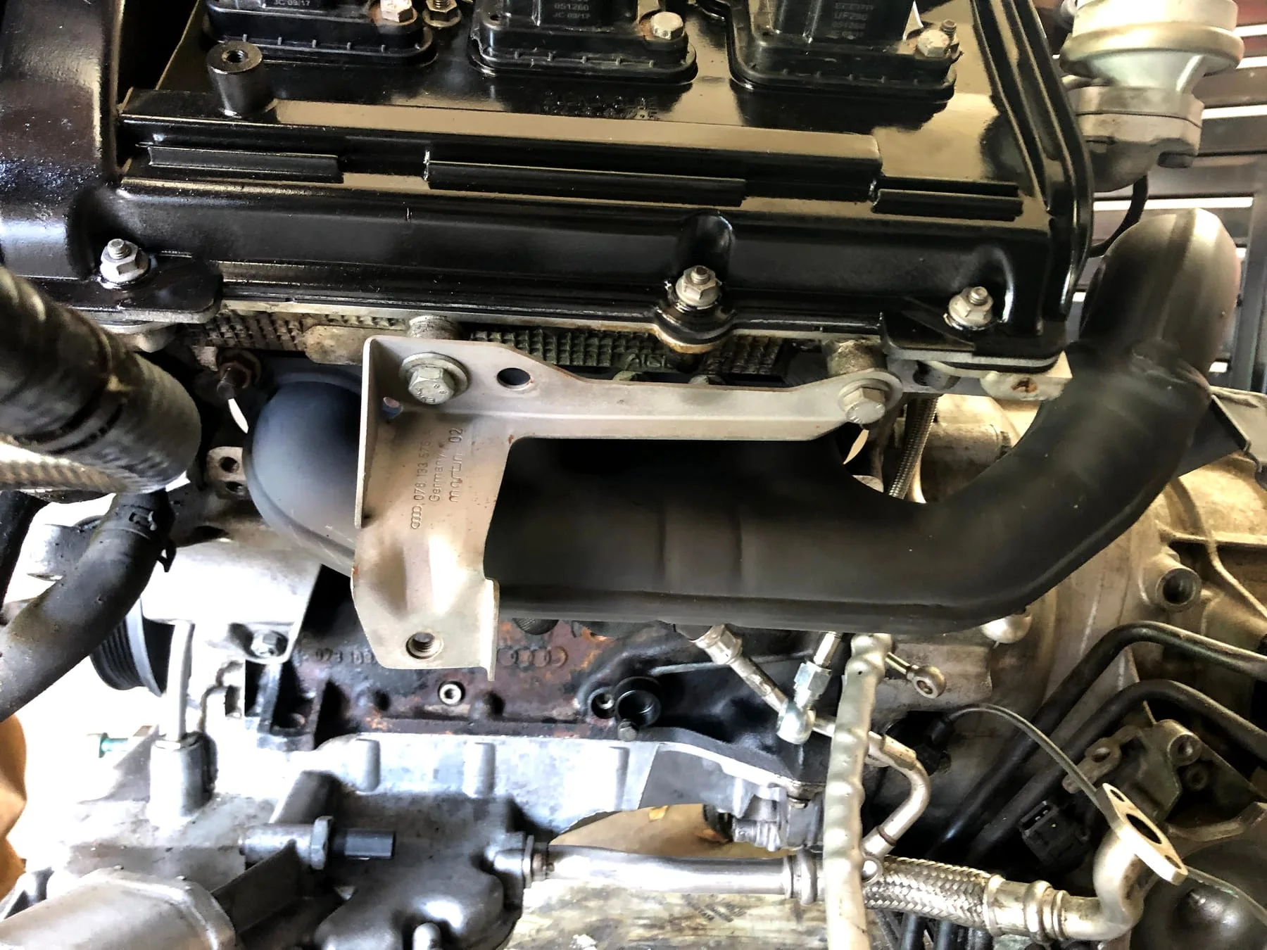 Reassembled B5 S4 engine with intake and plumbing installed