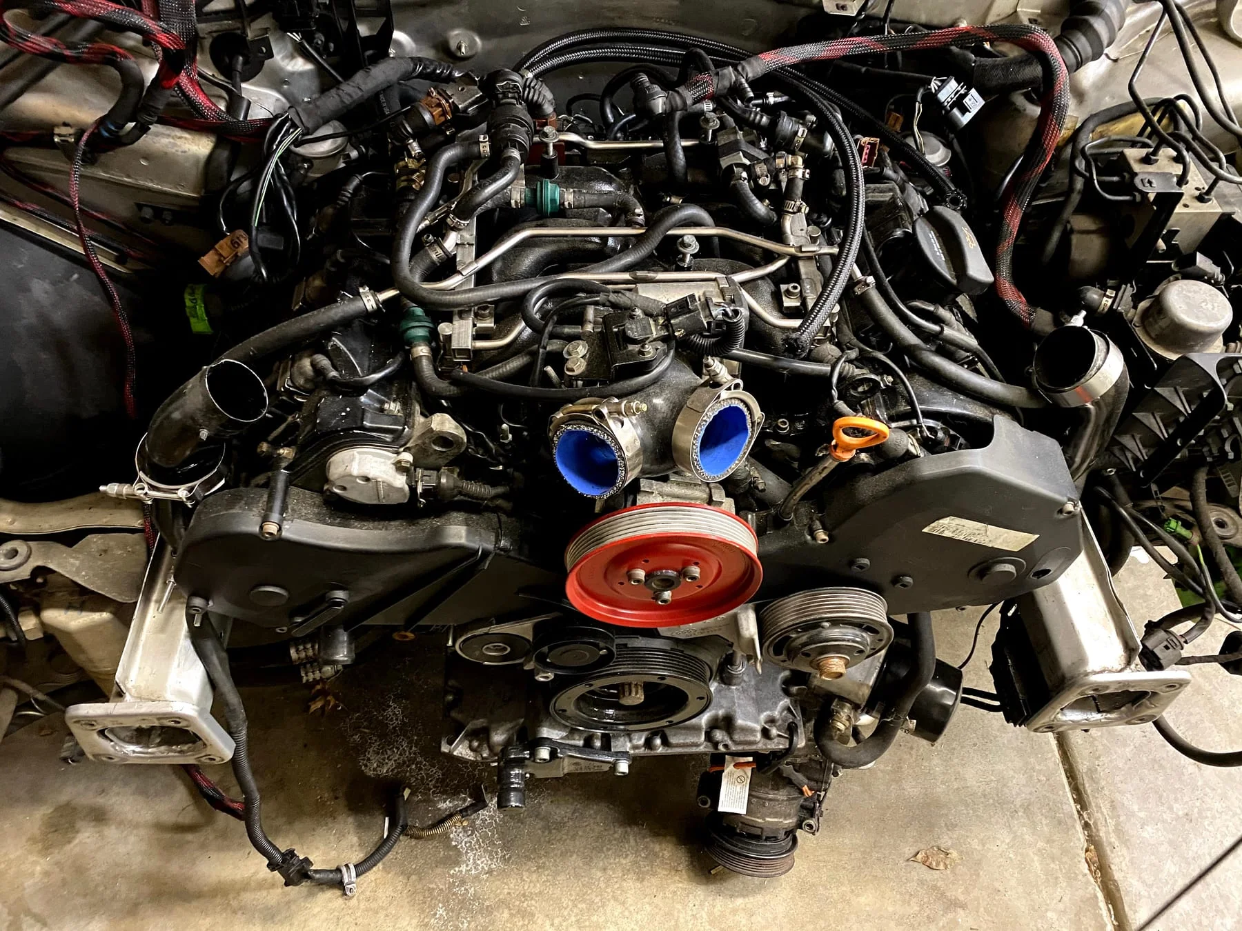 B5 S4 engine exposed for component replacement and routing work