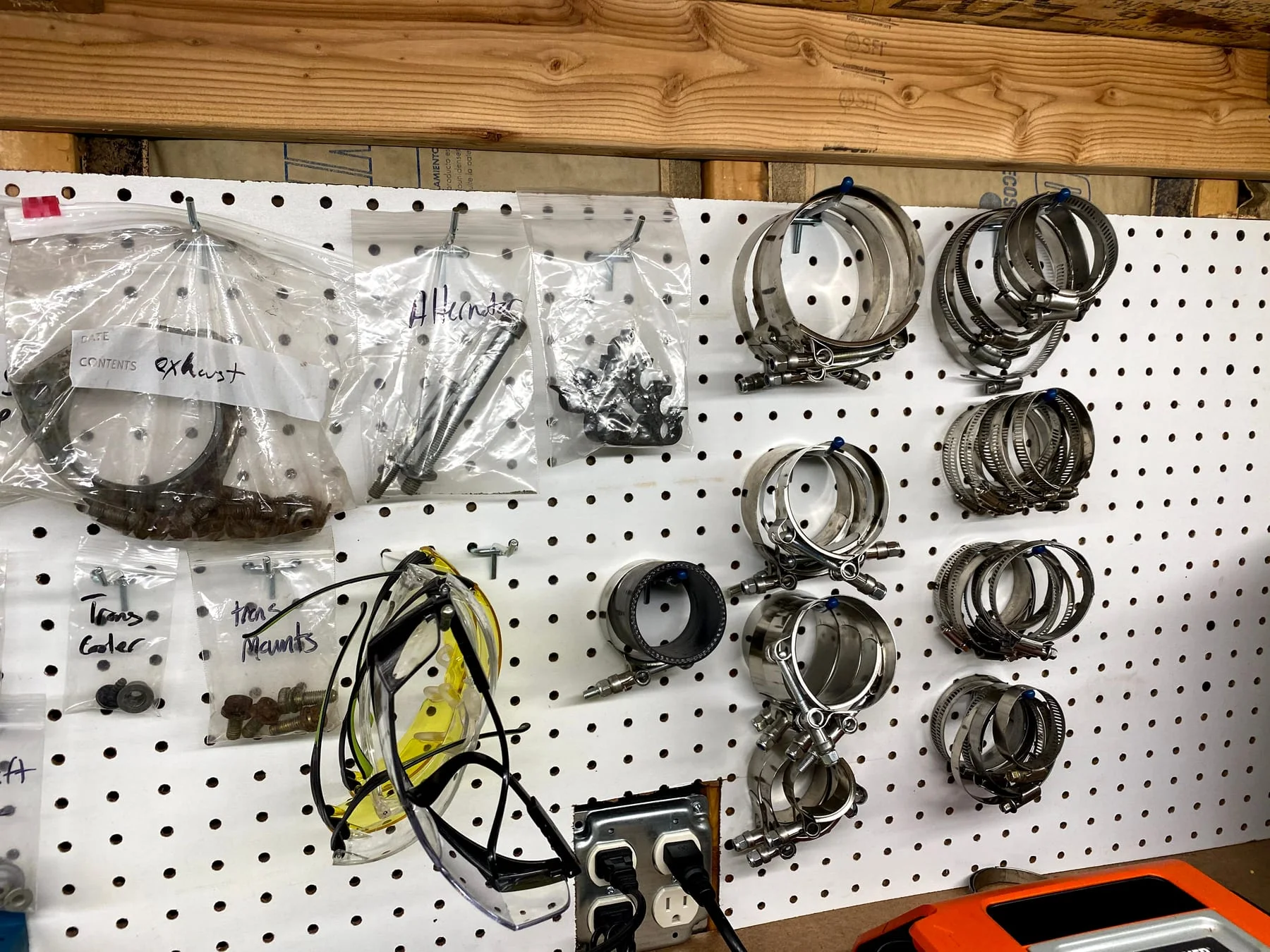 Cleaned B5 S4 components organized on a workshop wall