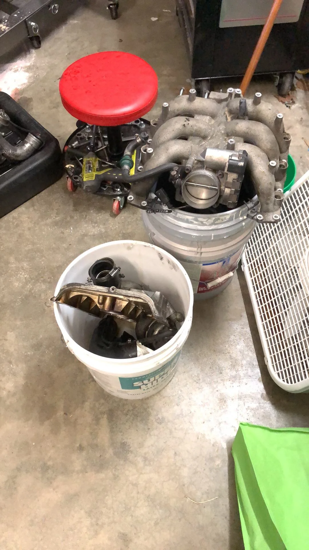 Turbocharger and related parts on a workbench
